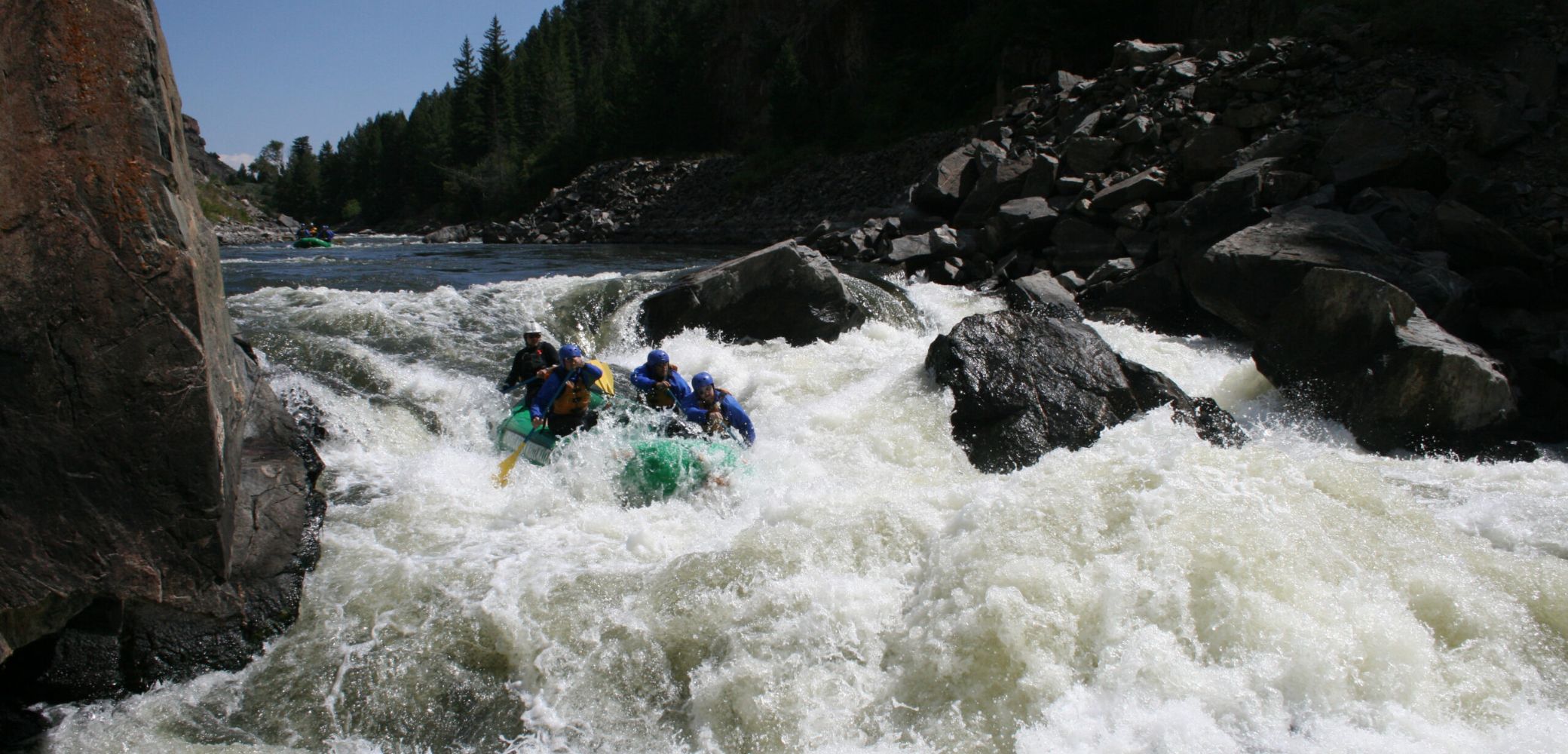 Navigating the Apple Sauce Rapids on a Gore Canyon whitewater rafting adventure