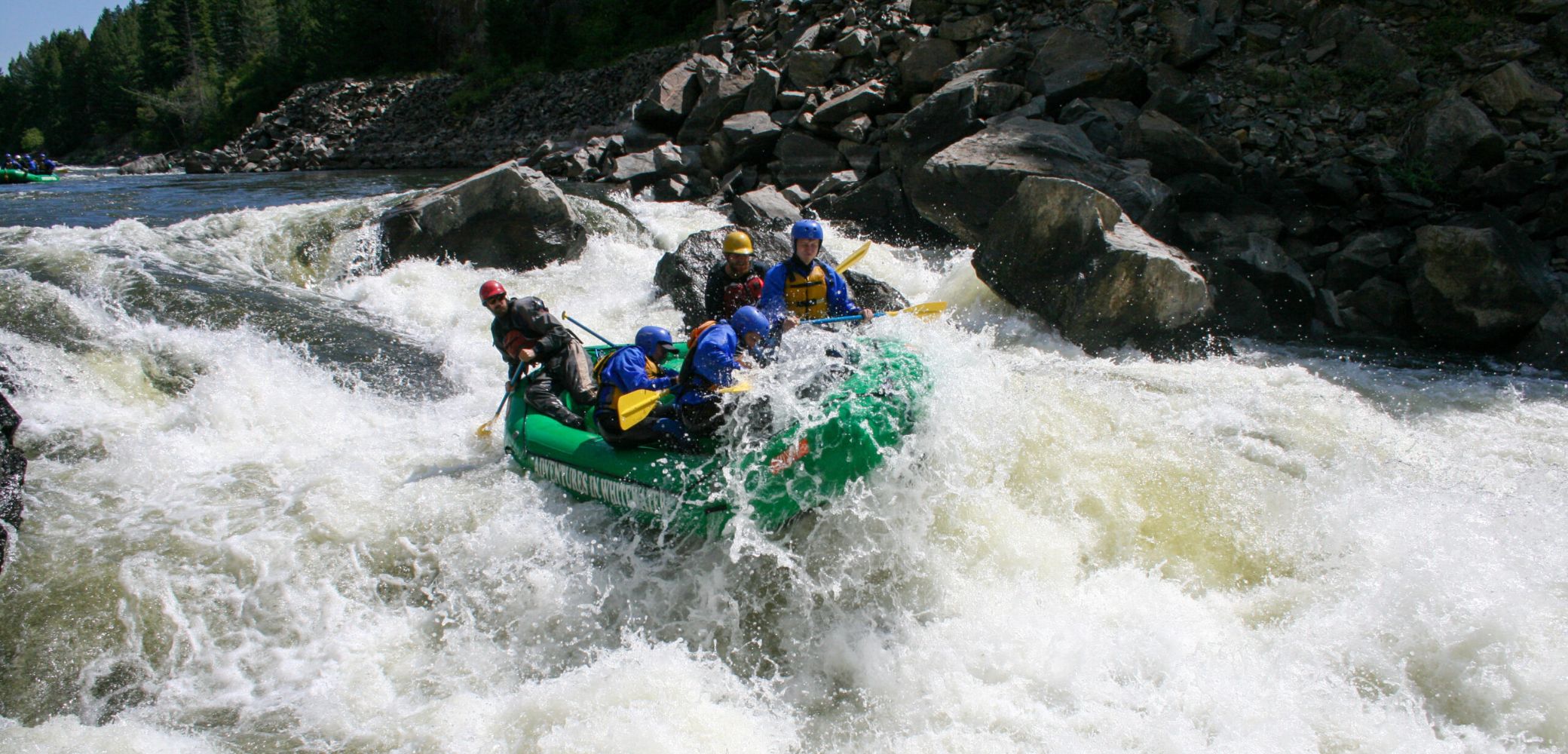 Navigating Apple Sauce Rapids on a Gore Canyon whitewater rafting tour