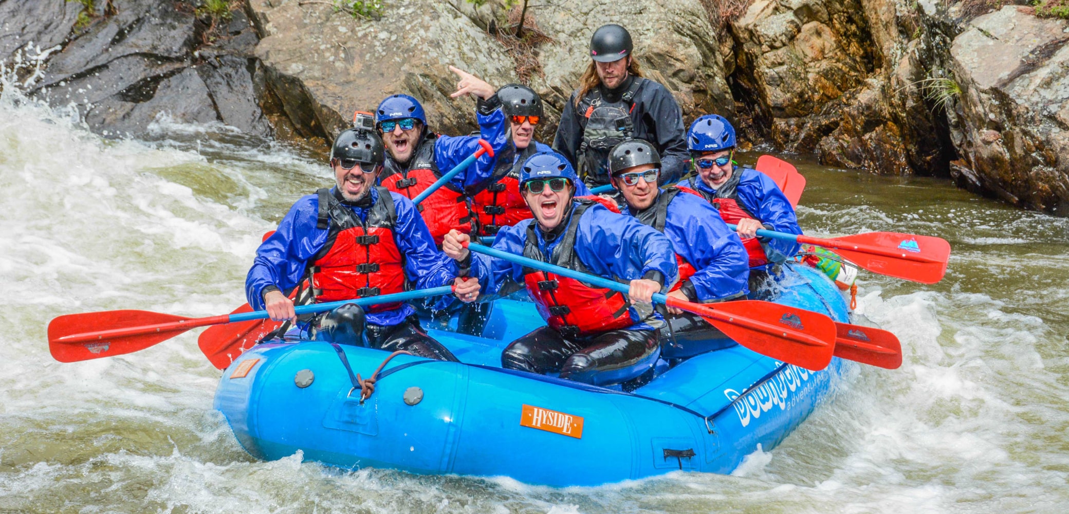 smiling faces on a lower clear creek canyon rafting trip