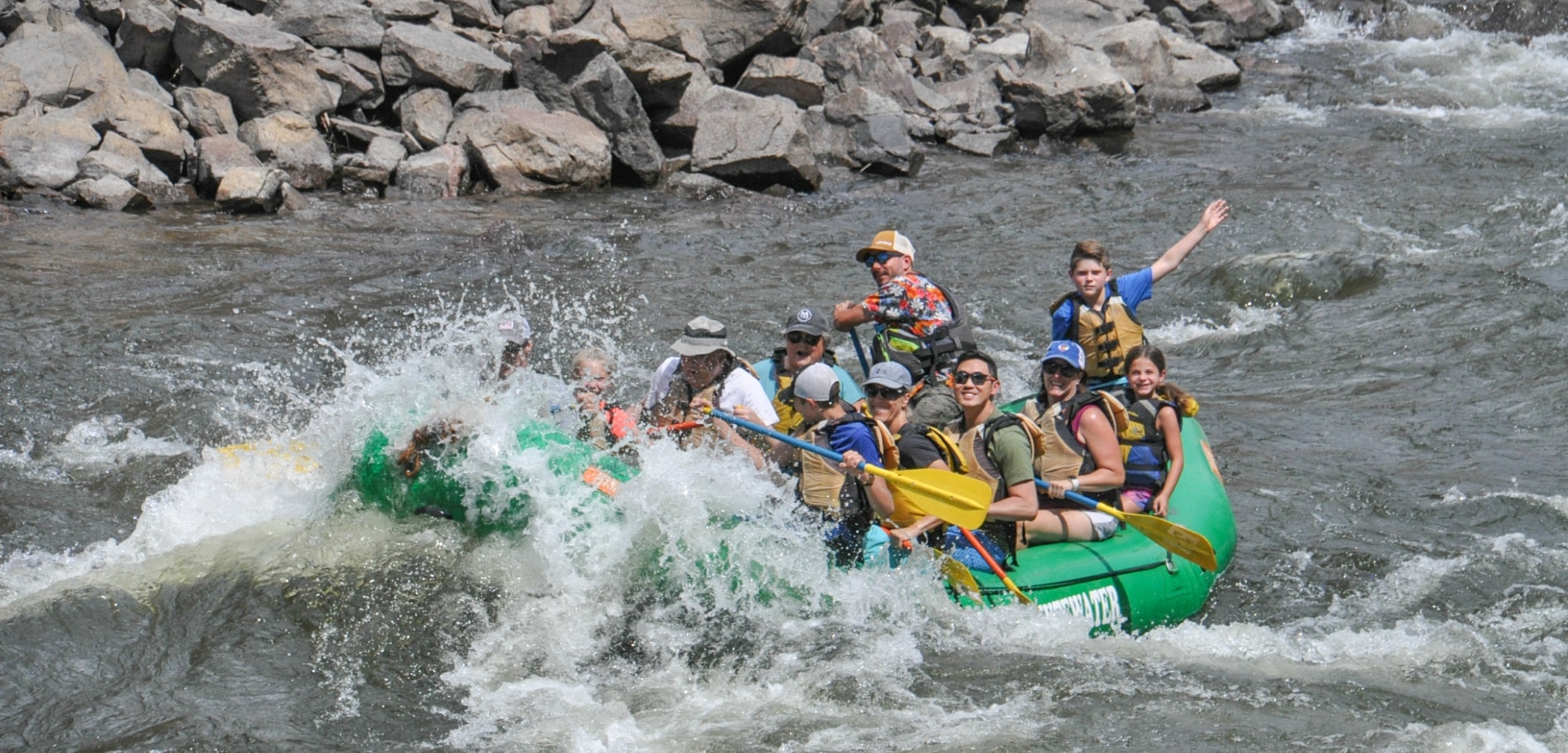 Happy guest and experienced guide on a upper colorado river rafting trip