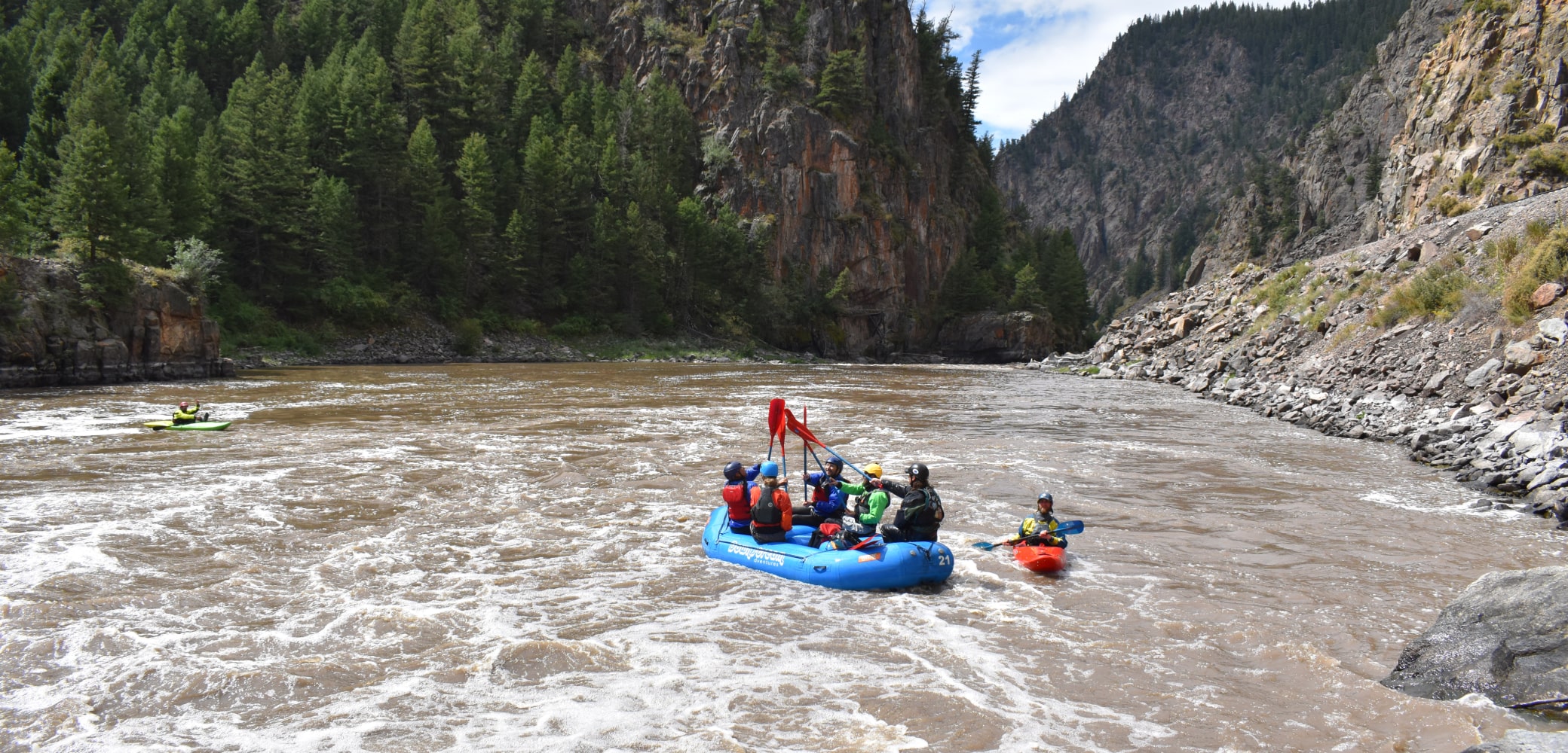 people celebrate while gore canyon rafting