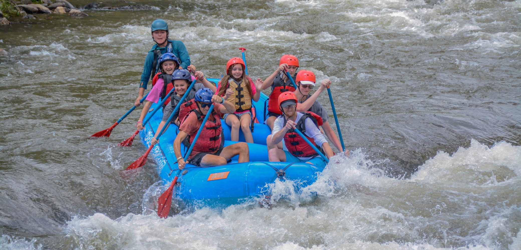Family and guide on middle clear creek rafting trip for beginners