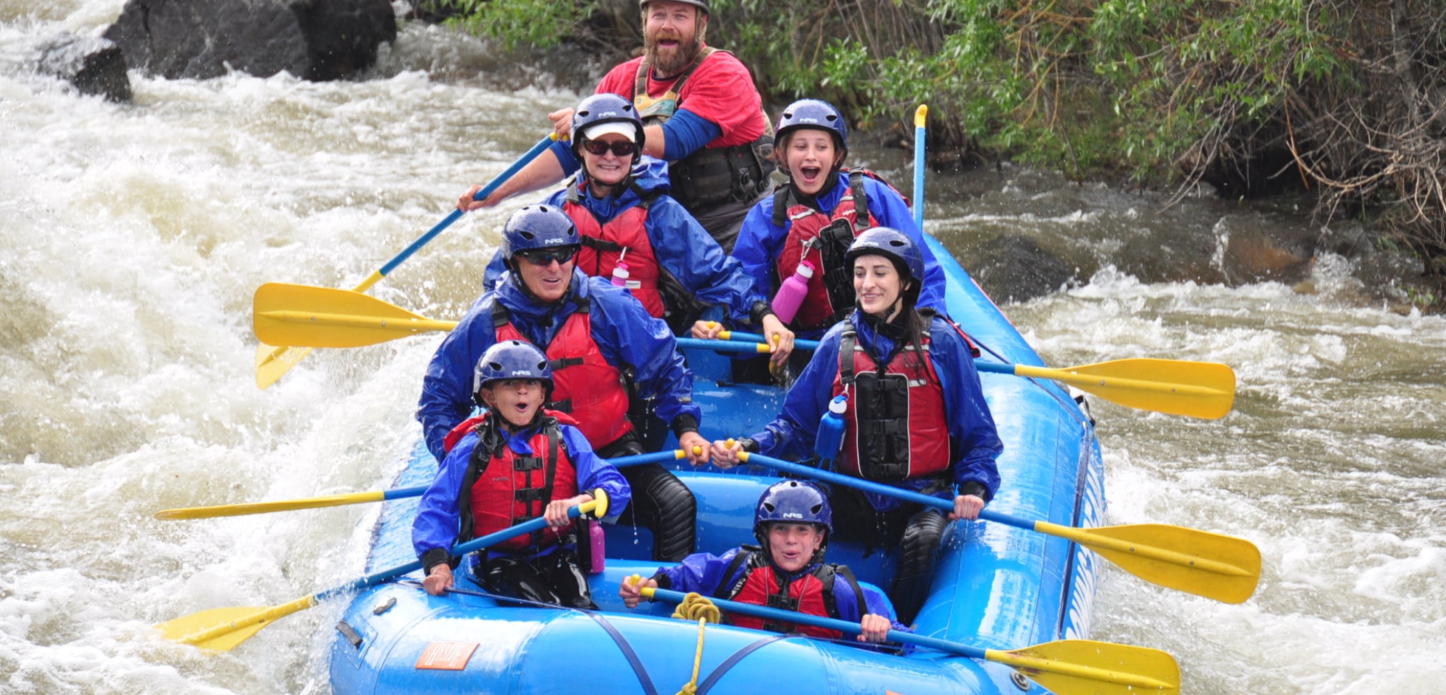 Guests enjoying white water rafting for beginners
