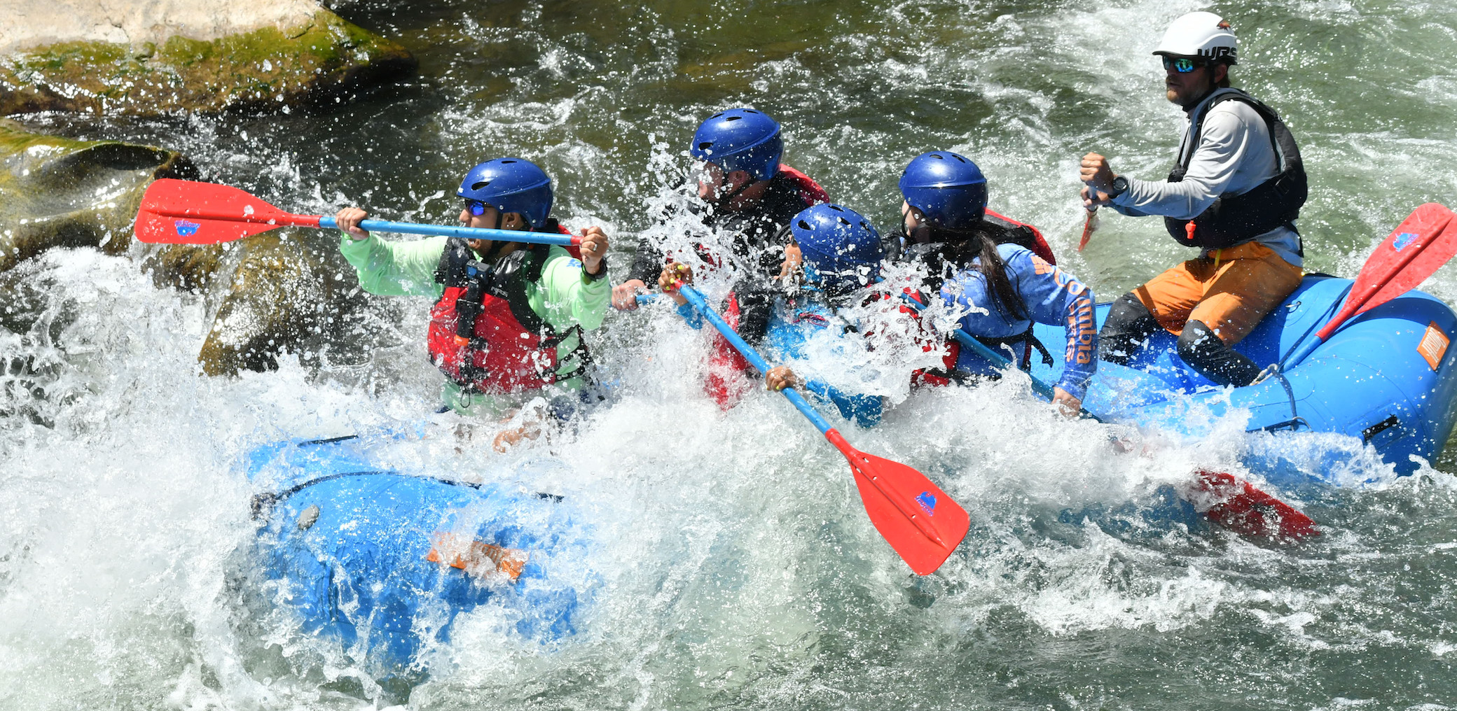 people making a splash while rafting the Arkansas River on the Numbers in Colorado near Denver