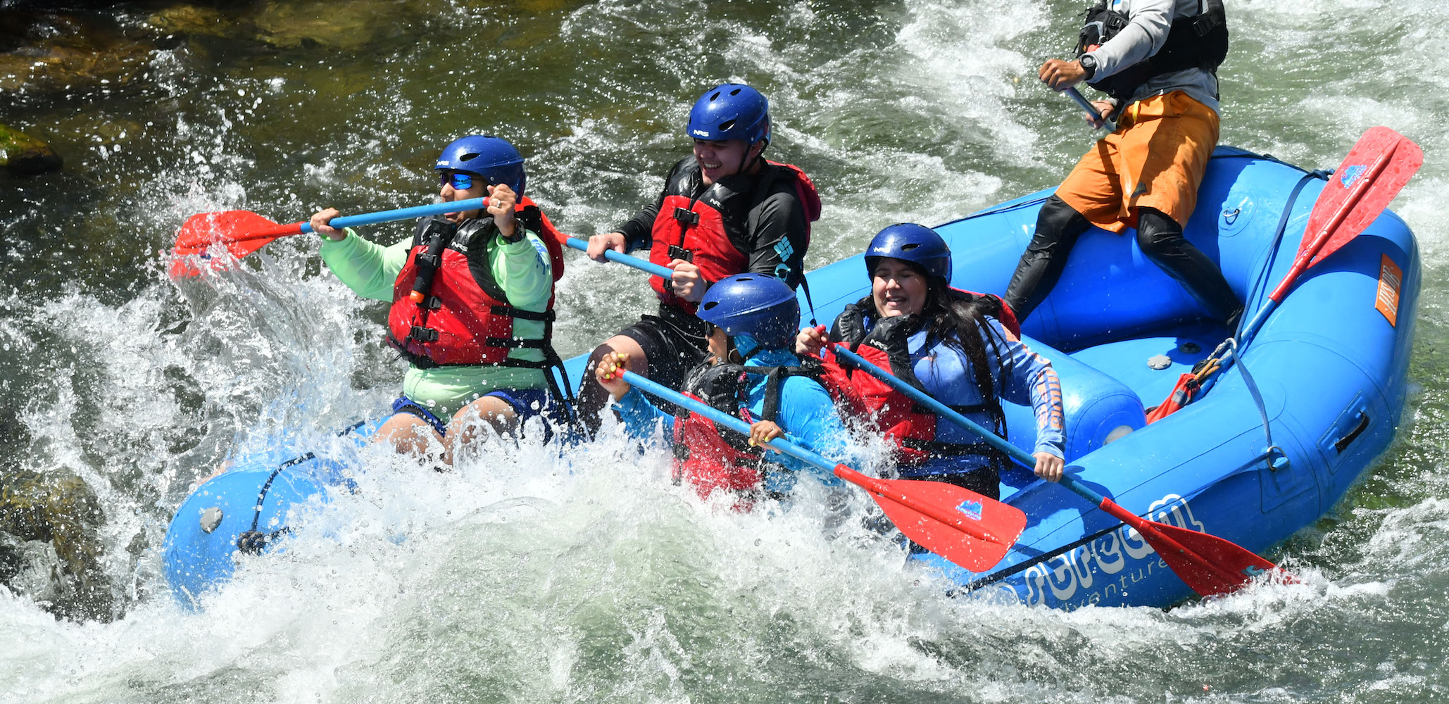 people navigating the Numbers rapids on an Arkansas River whitewater rafting trip