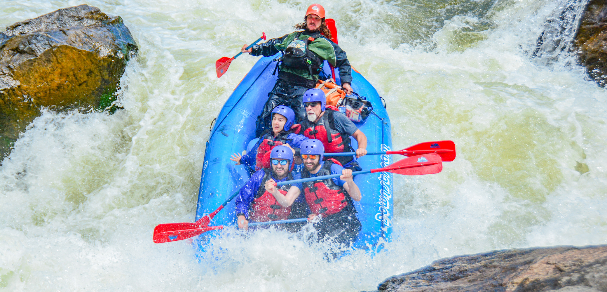 People navigating huge rapids on a Gore Canyon whitewater rafting trip in Colorado