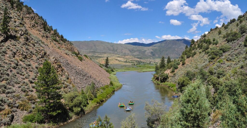 people rafting through a canyon on the Upper Colorado River