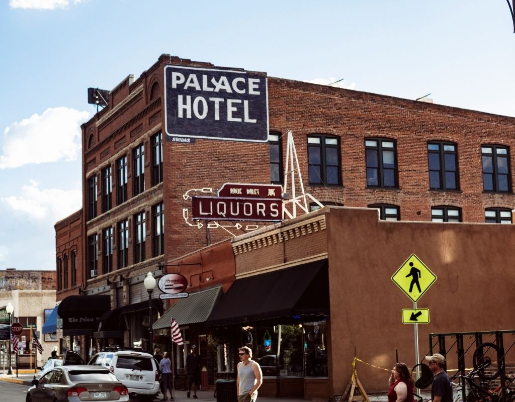 old brick building that says Palace Hotel in Salida, CO