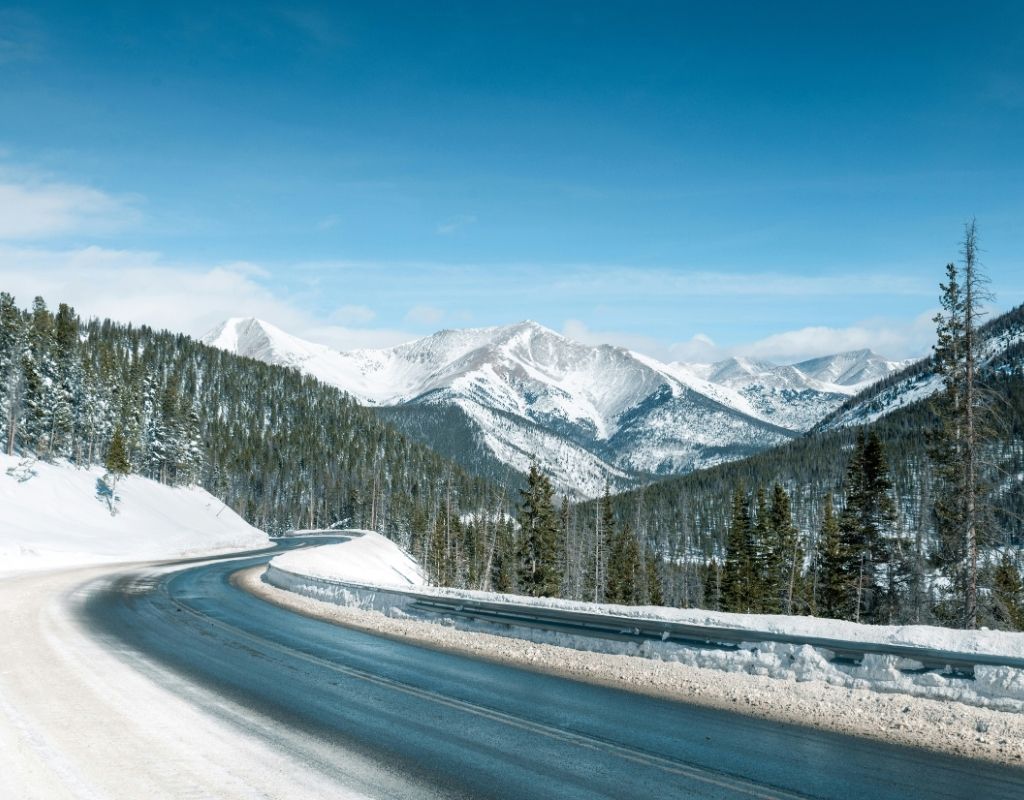 a road winding toward snowy mountains near Salida, CO
